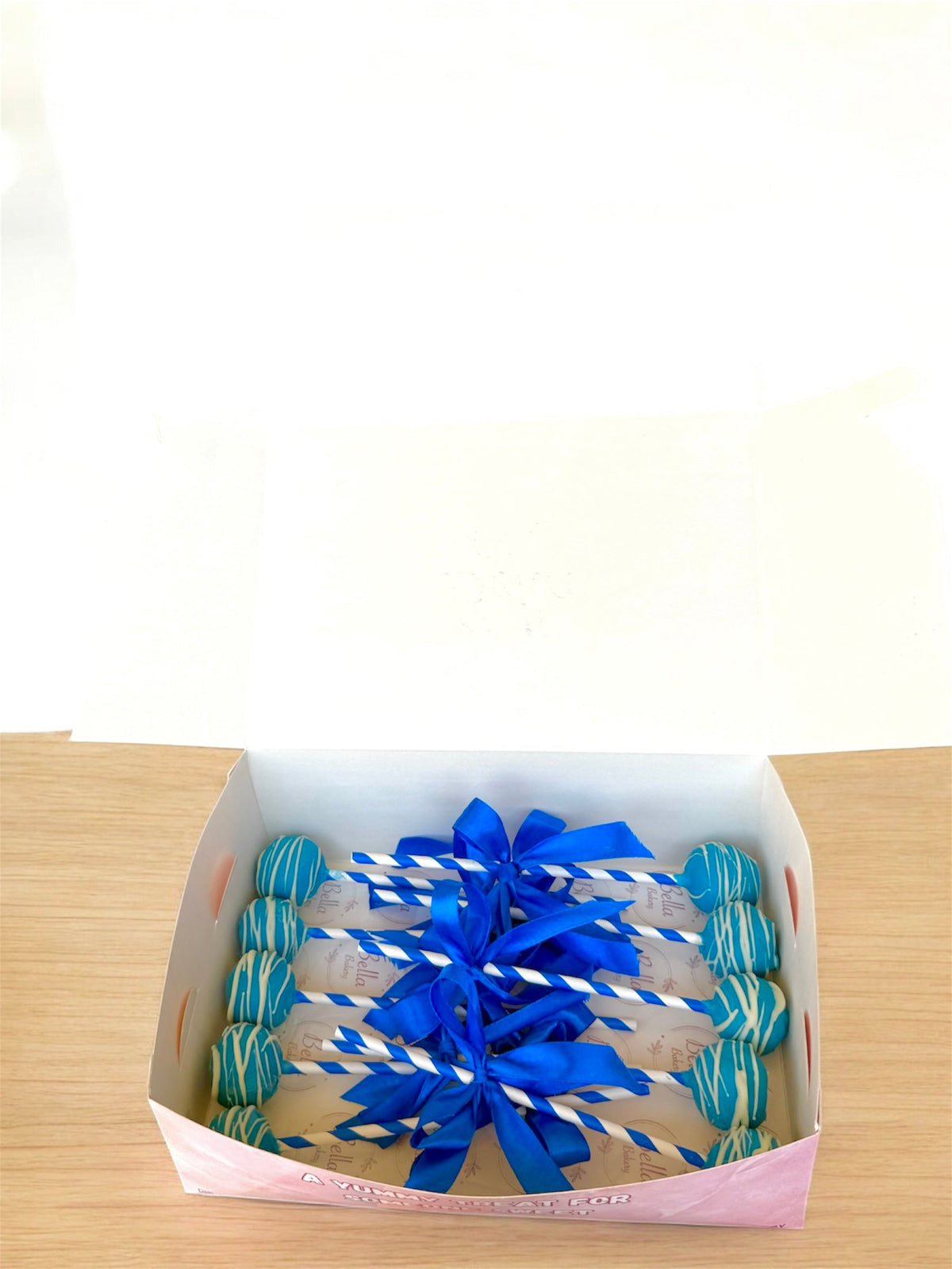 Customized Pink and Blue cake pops
