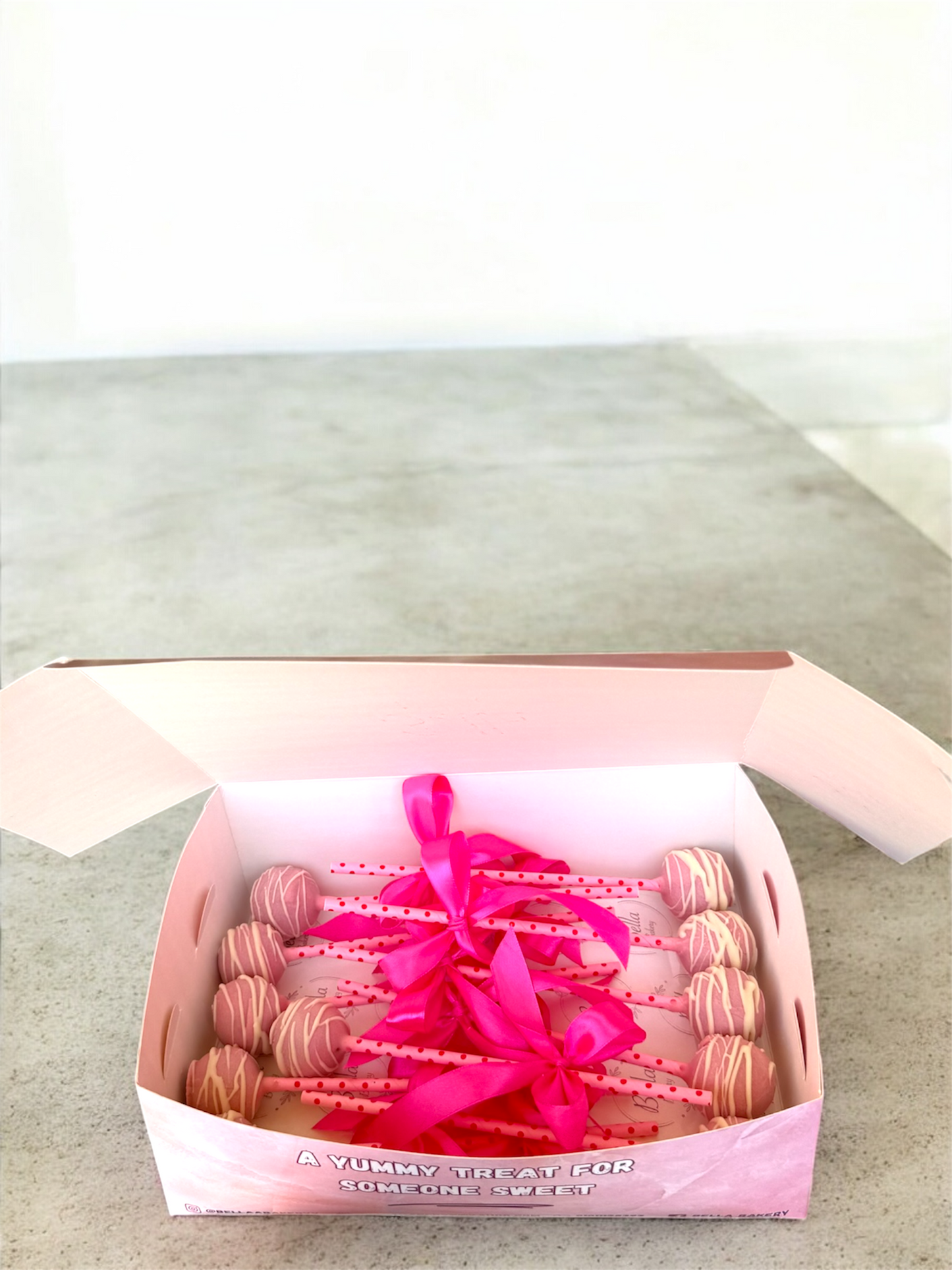 Customized Pink and Blue cake pops