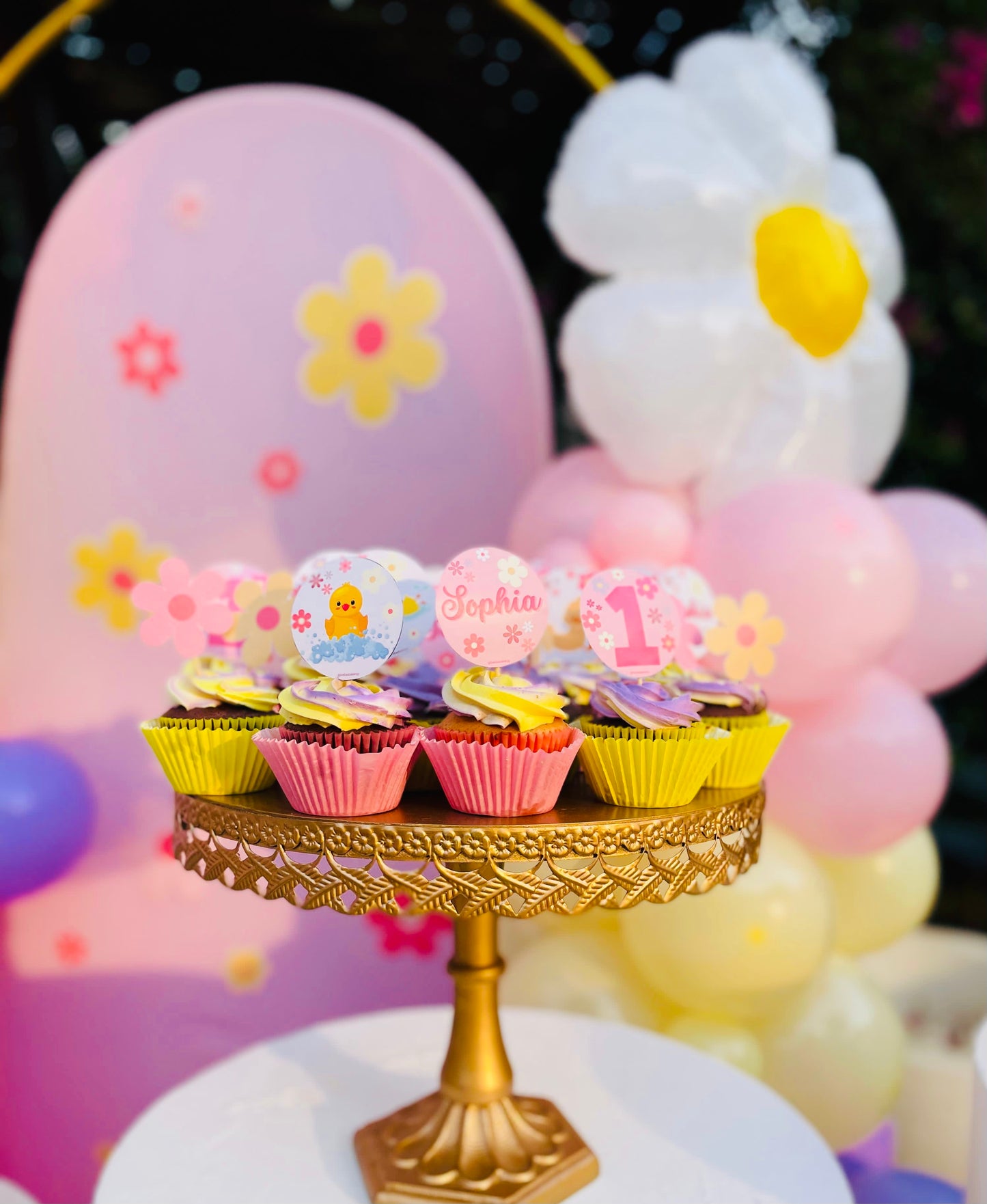 Customized cupcakes with toppers (pink ,Yellow ,purple )