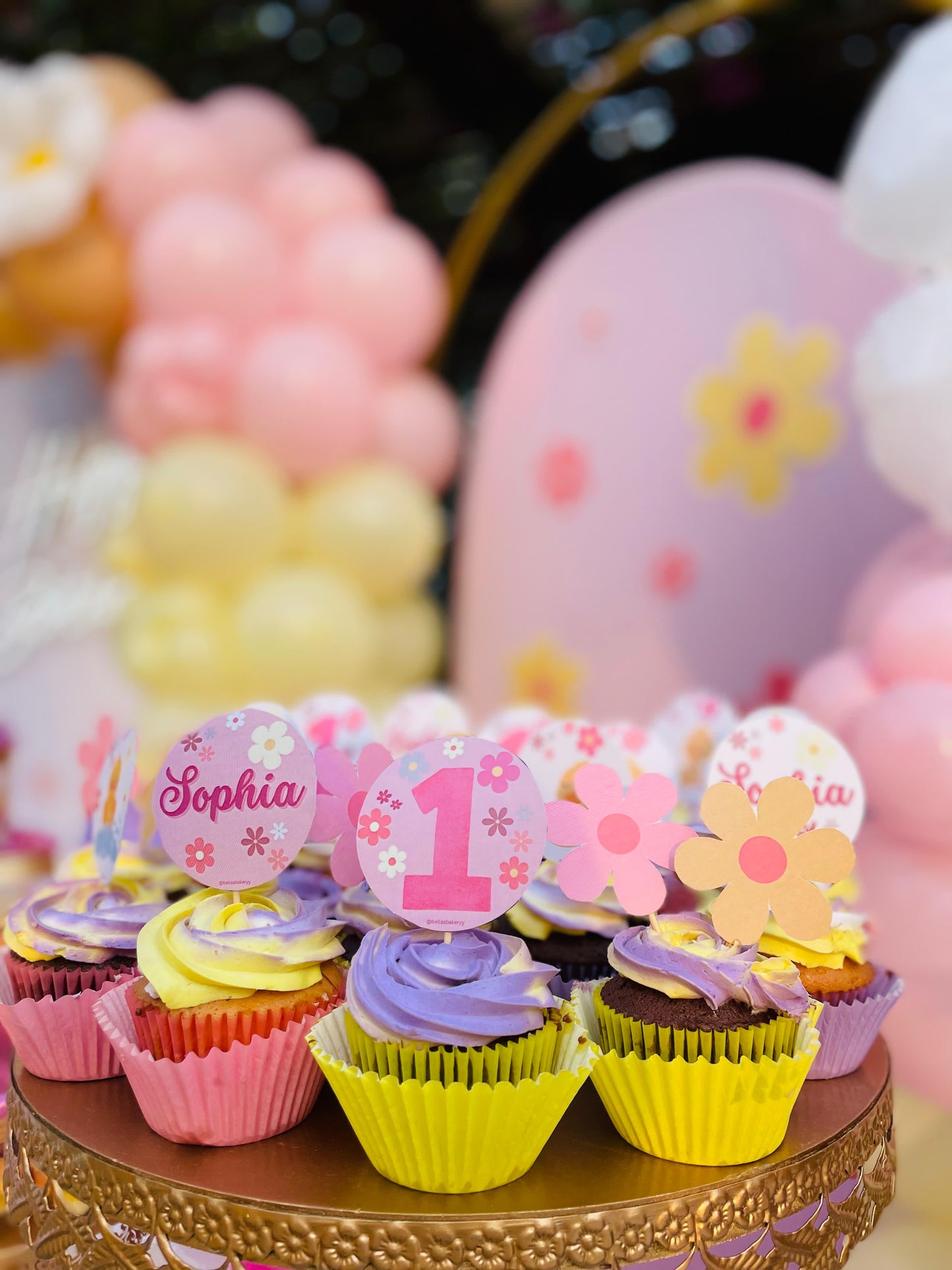 Customized cupcakes with toppers (pink ,Yellow ,purple )